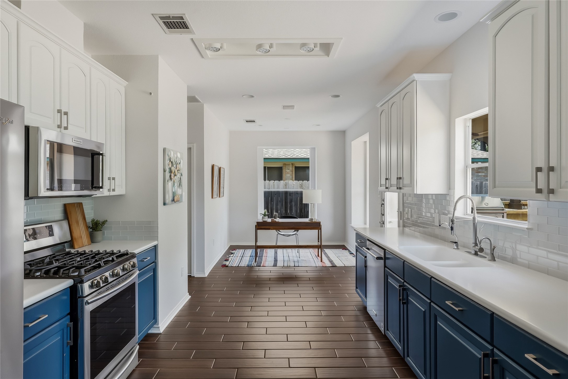 4400 Chickasaw Court Austin, TX 78749 - Photo 4 of 36 Corian countertops and stainless steel appliances