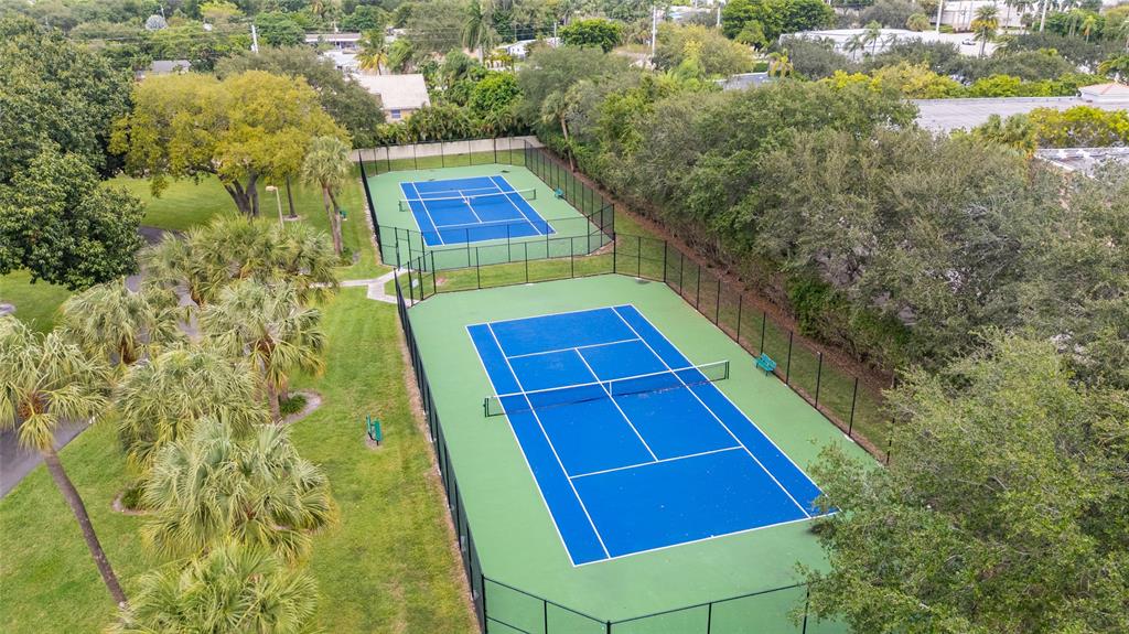 3130 Millwood Terrace, Unit 115 Boca Raton, FL 33431 - Photo 34 of 34 a view of a tennis court