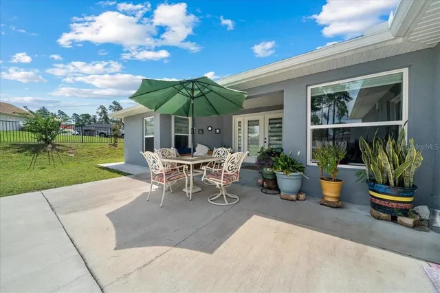a kitchen with cabinets and white appliances