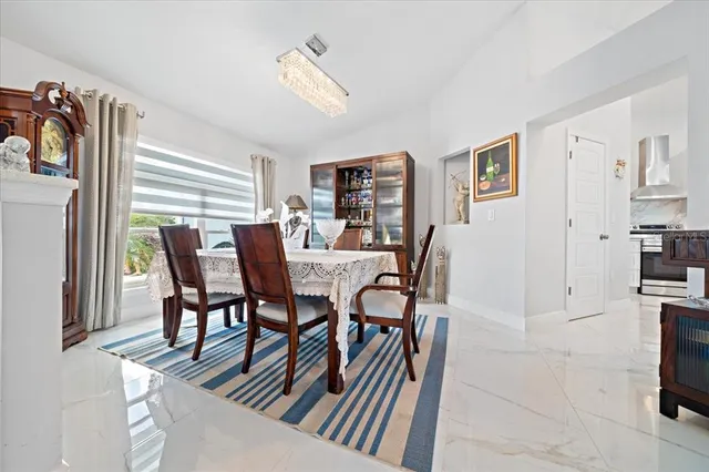 a bedroom with bed and a flat screen tv