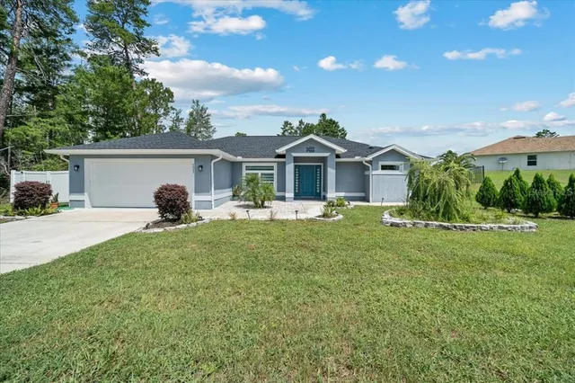 a house view with a garden space