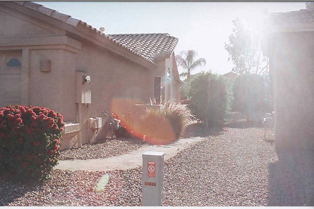 14903 Piccadilly Road Goodyear, AZ 85395 - Photo 2 of 16 Side of home