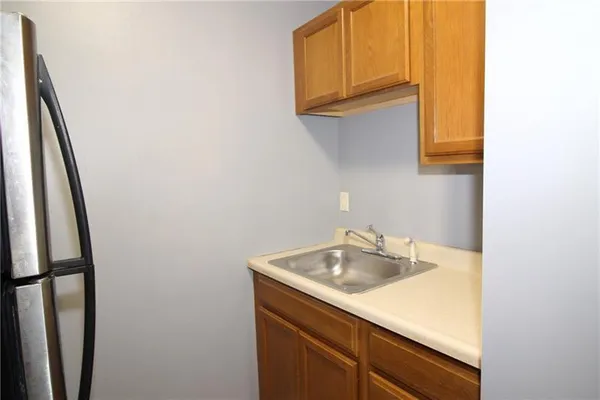 a bathroom with a sink and a window