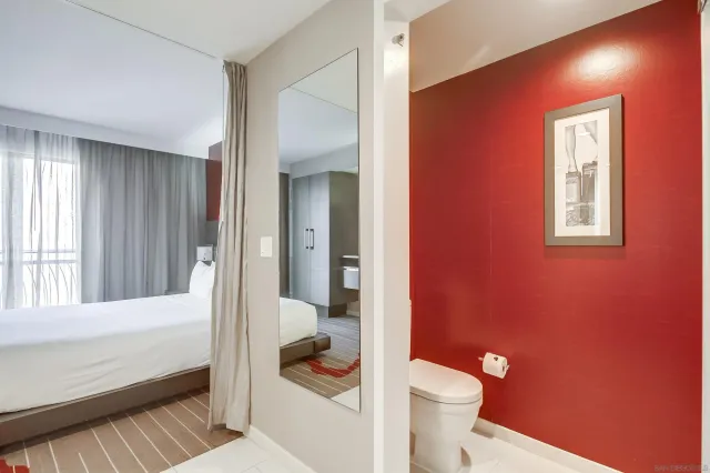 a bathroom with a toilet and a sink