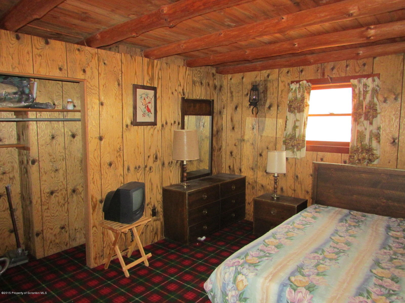 1291 Conroy Road Montrose, PA 18801 - Photo 13 of 34 a bedroom with a bed a table and chair