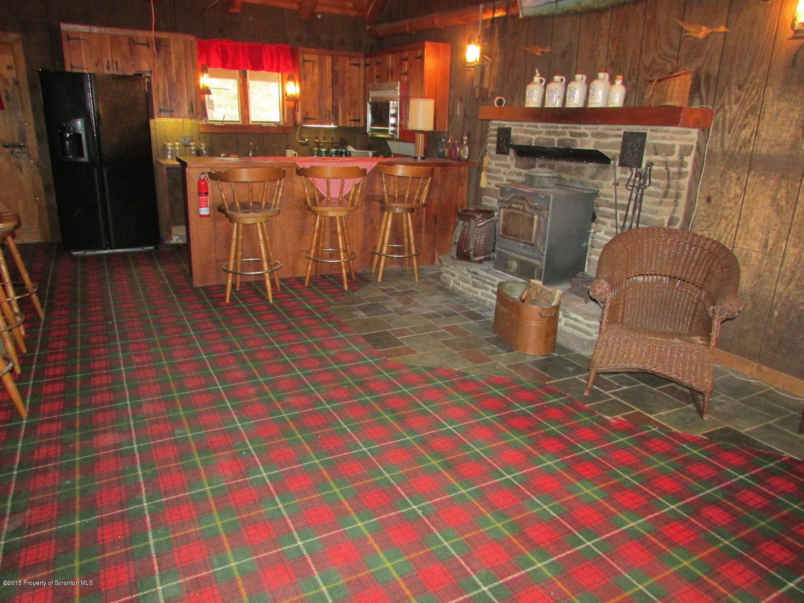 1291 Conroy Road Montrose, PA 18801 - Photo 7 of 34 a dining room with furniture and a fireplace