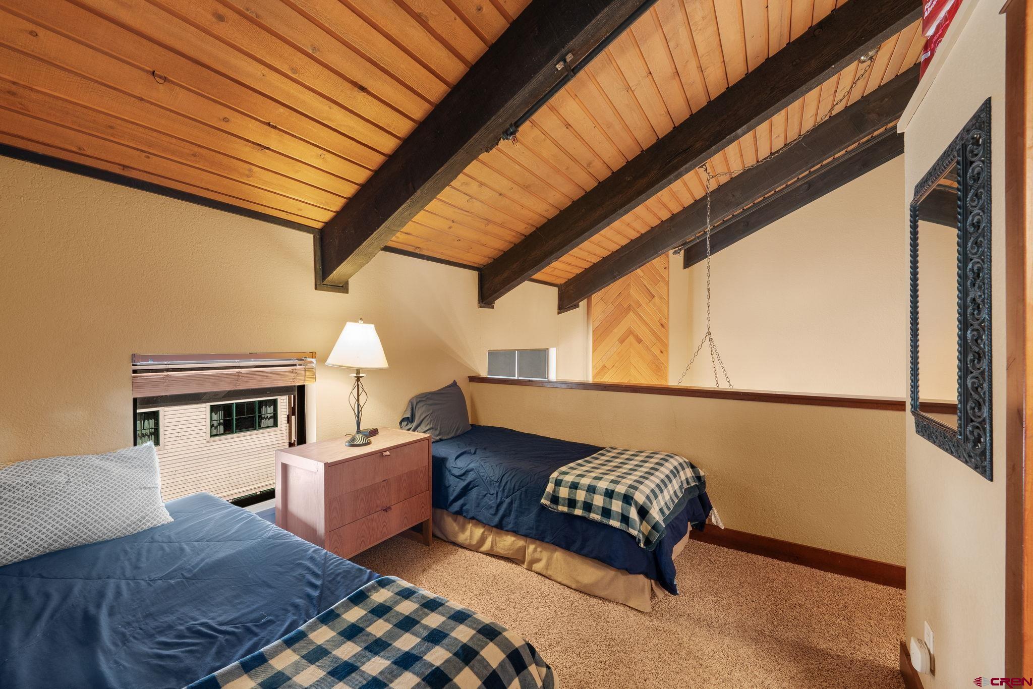 11 Emmons Road, Unit 433 Crested Butte, CO 81225 - Photo 12 of 32 a view of kitchen with furniture and a fireplace