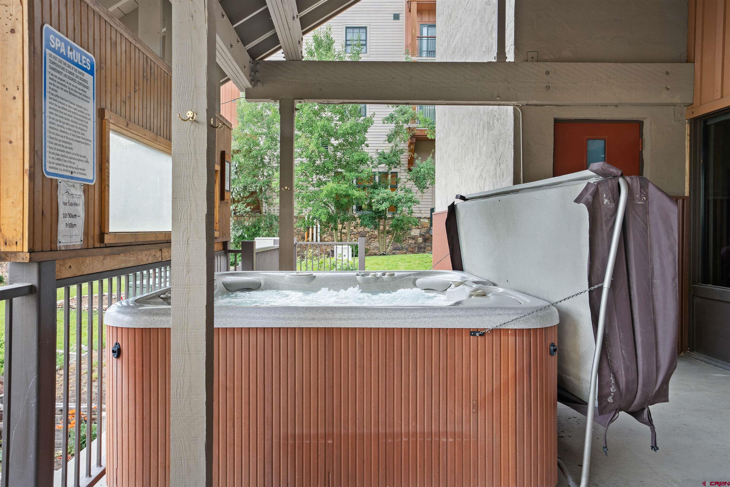 11 Emmons Road, Unit 433 Crested Butte, CO 81225 - Photo 17 of 32 a dining room with a window and a kitchen view