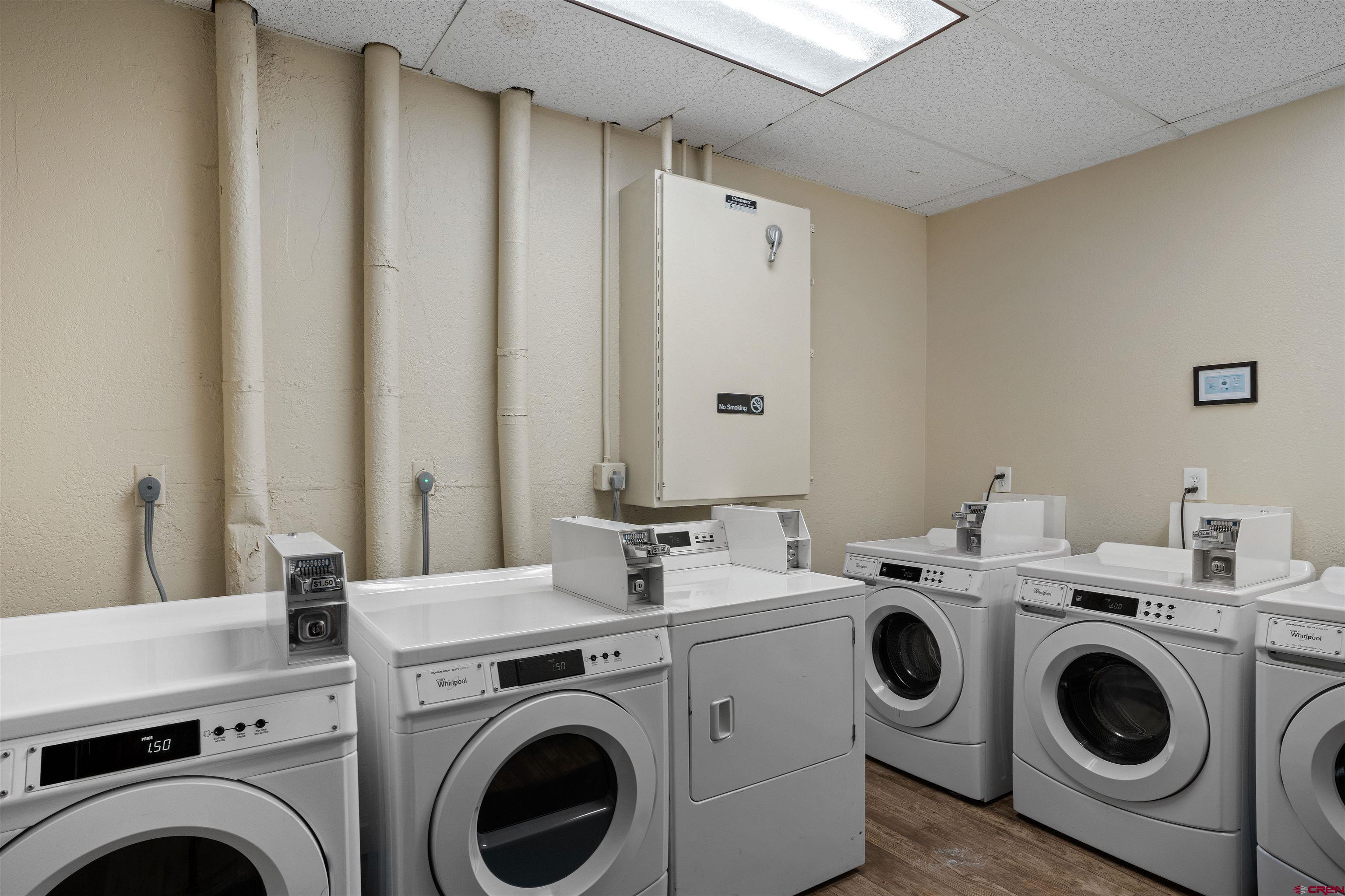 11 Emmons Road, Unit 433 Crested Butte, CO 81225 - Photo 19 of 32 a utility room with dryer and washer