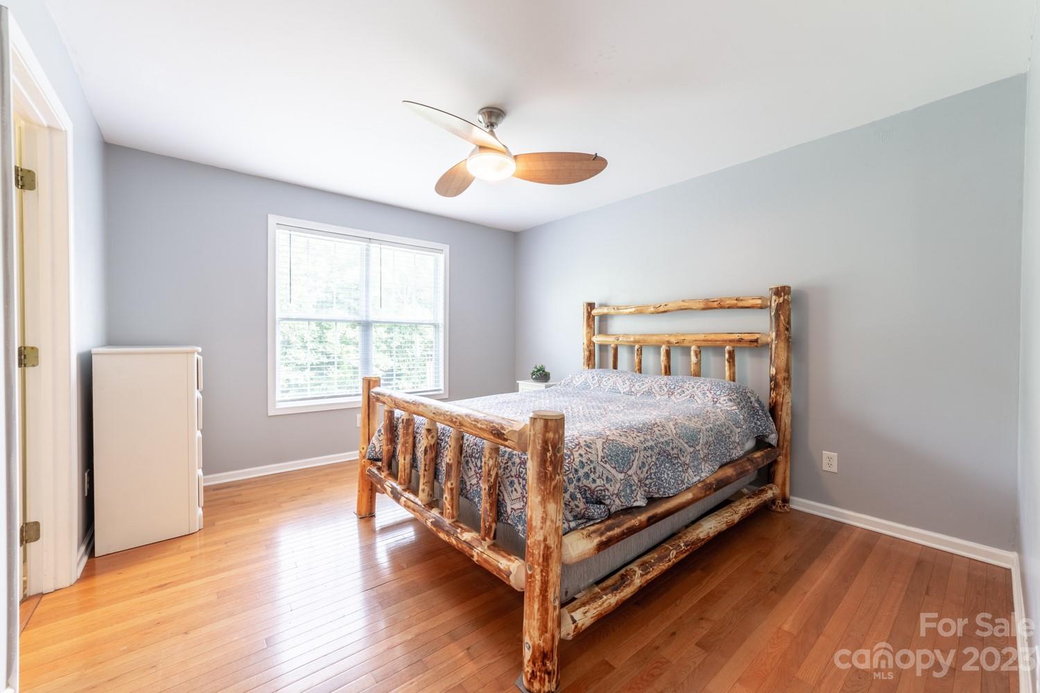 327 Unity Church Road Kings Mountain, NC 28086 - Photo 18 of 30 a bedroom with a bed and a large window