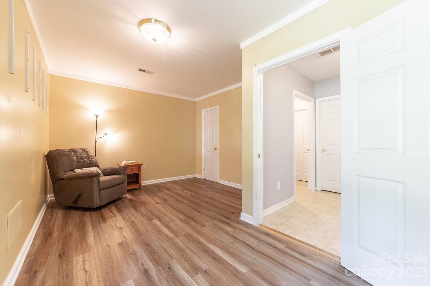 327 Unity Church Road Kings Mountain, NC 28086 - Photo 25 of 30 a living room with furniture and a wooden floor