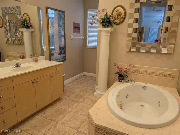 a bathroom with a sink and mirror