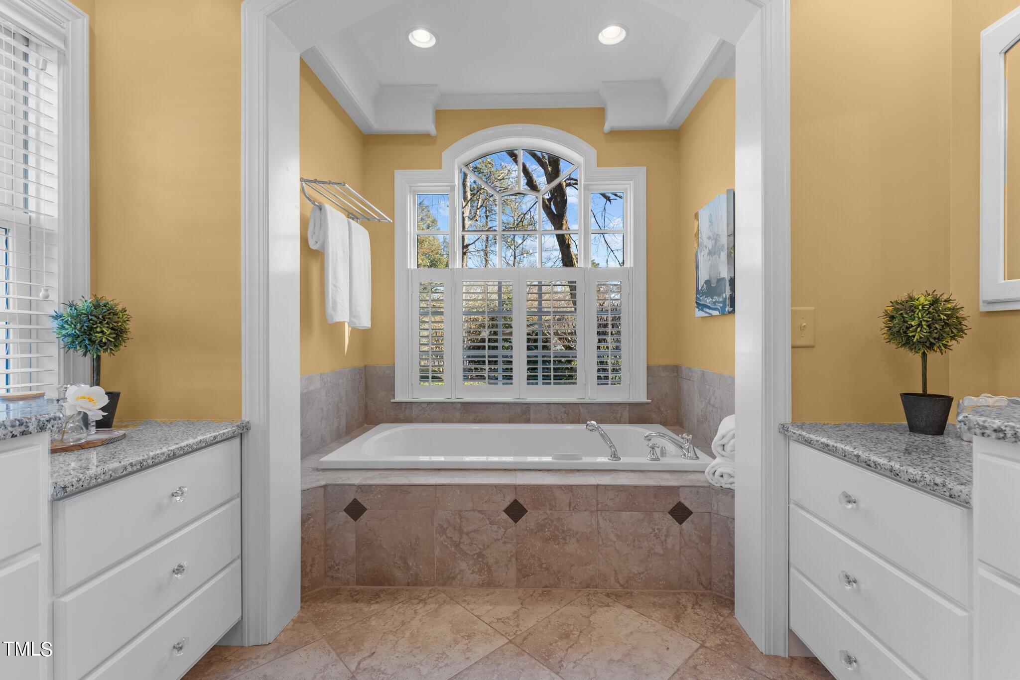 8 Surrey Lane Durham, NC 27707 - Photo 14 of 50 a bathroom with a granite countertop sink mirror and window
