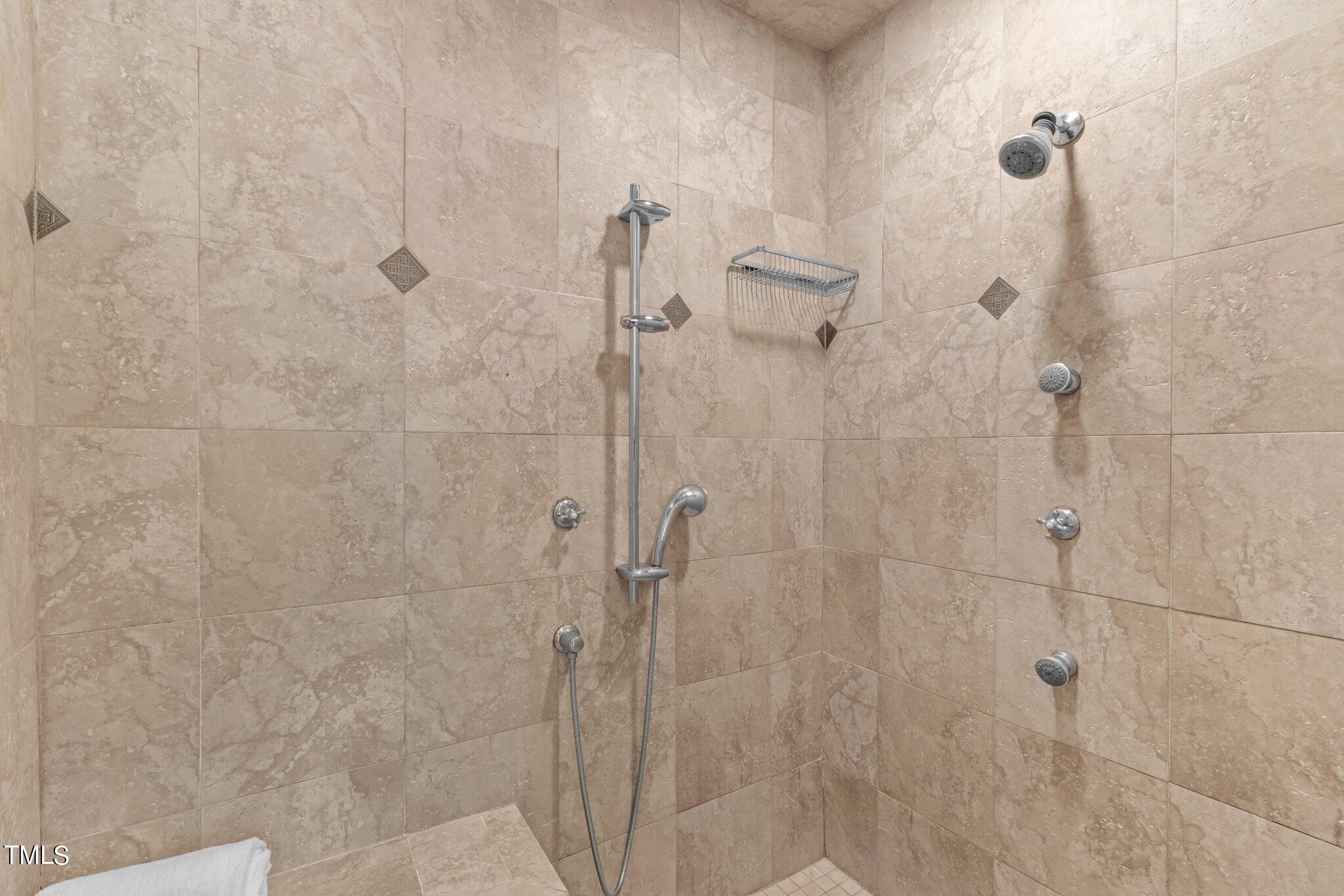 8 Surrey Lane Durham, NC 27707 - Photo 16 of 50 a bathroom with a shower