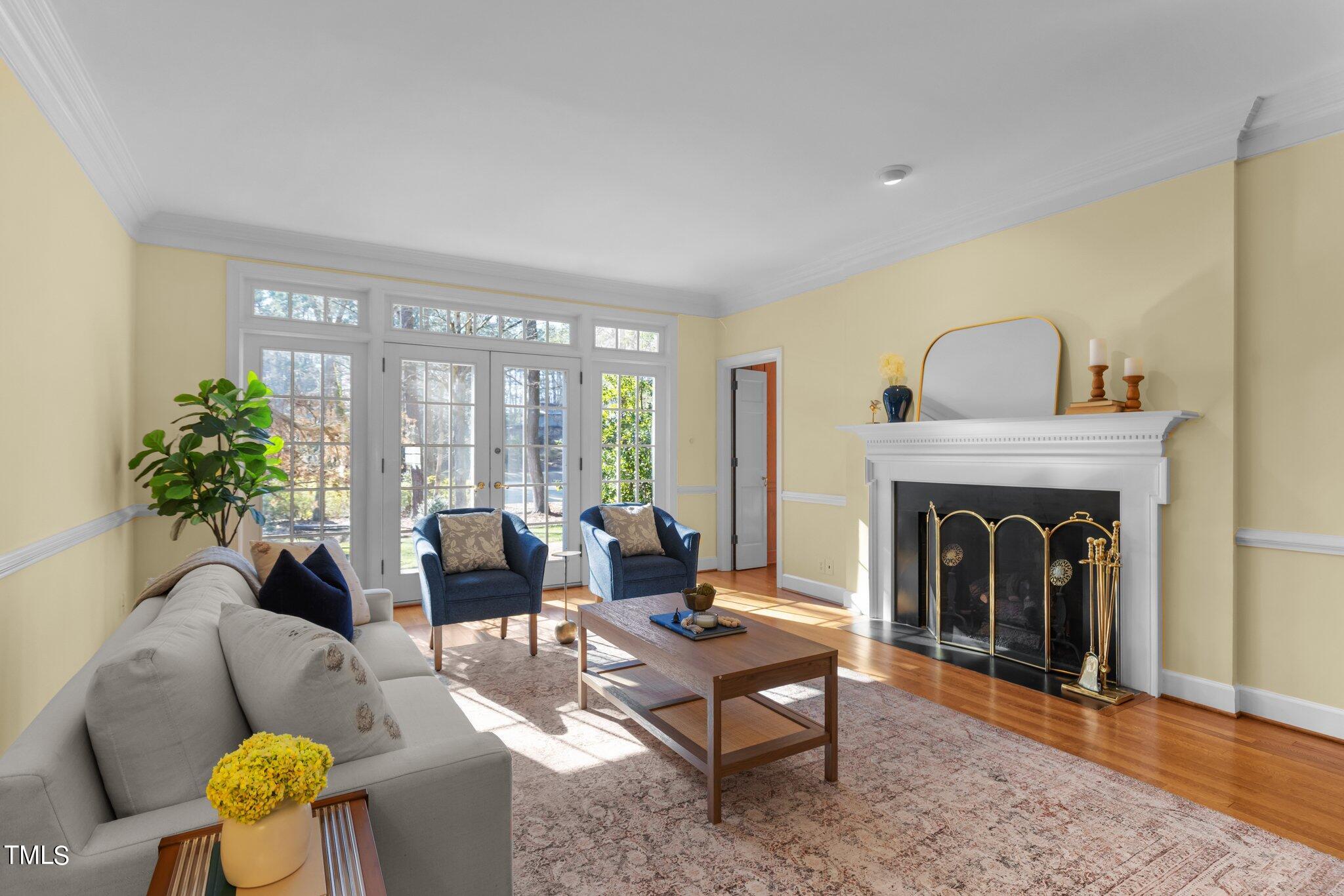8 Surrey Lane Durham, NC 27707 - Photo 19 of 50 a living room with furniture and a fireplace