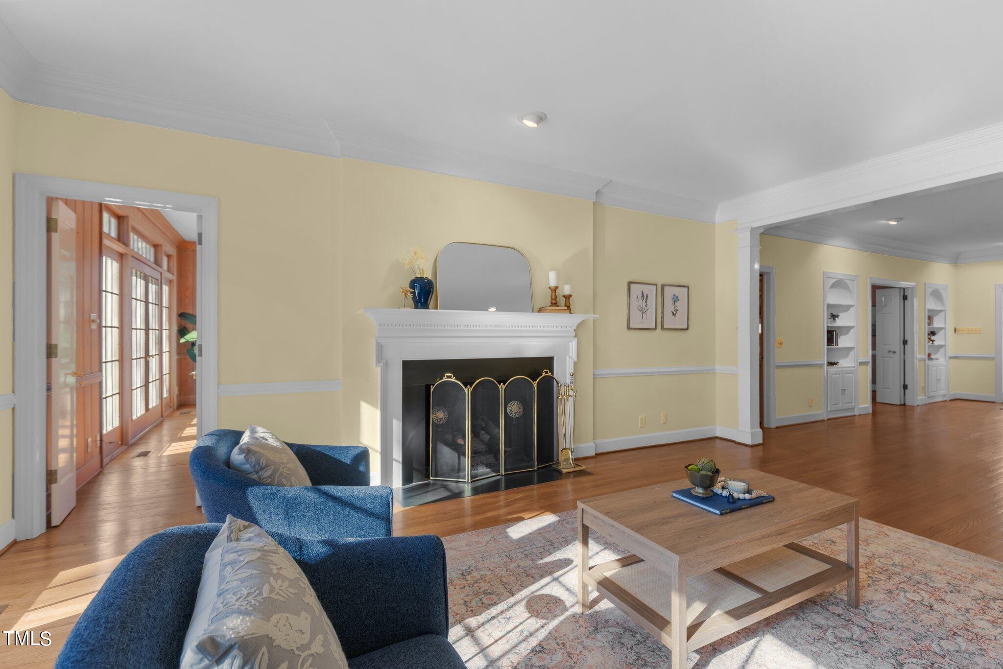 8 Surrey Lane Durham, NC 27707 - Photo 20 of 50 a living room with furniture and a fireplace