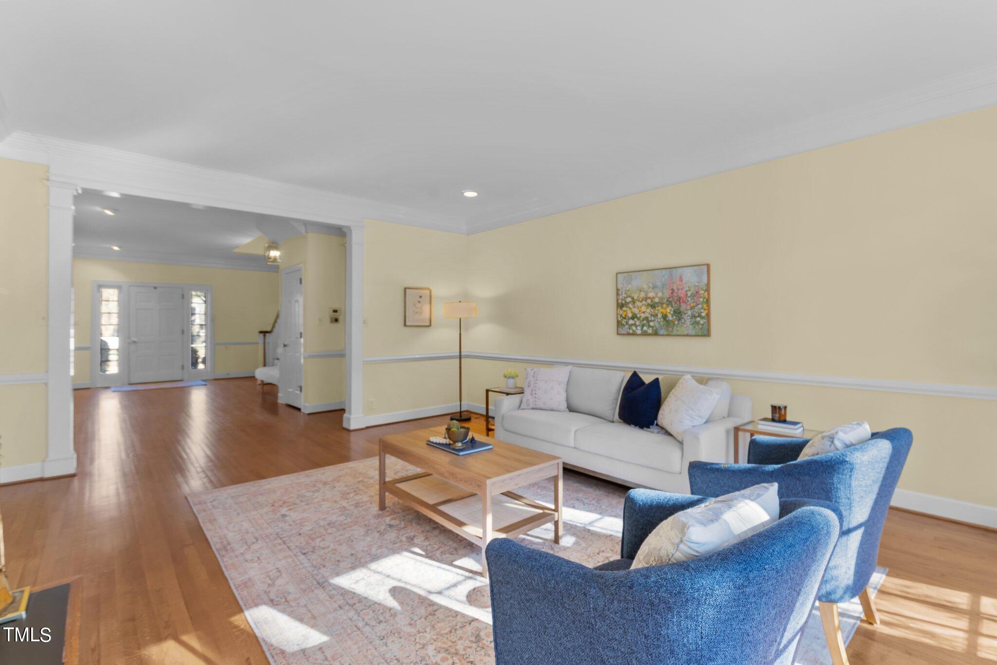 8 Surrey Lane Durham, NC 27707 - Photo 21 of 50 a living room with furniture and wooden floor
