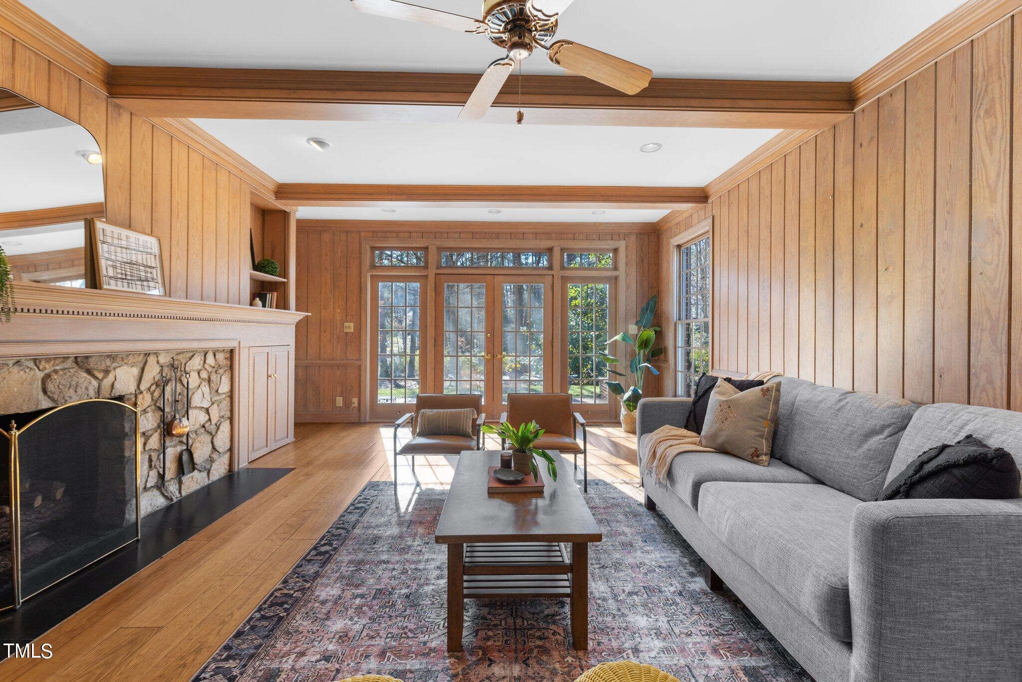 8 Surrey Lane Durham, NC 27707 - Photo 24 of 50 a living room with furniture and a fireplace
