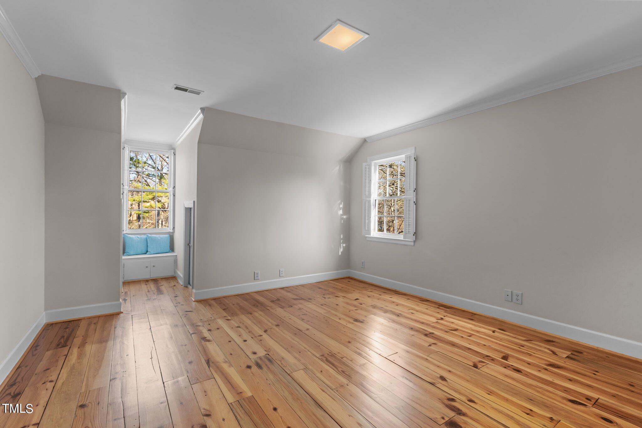 8 Surrey Lane Durham, NC 27707 - Photo 35 of 50 wooden floor in an empty room with a window