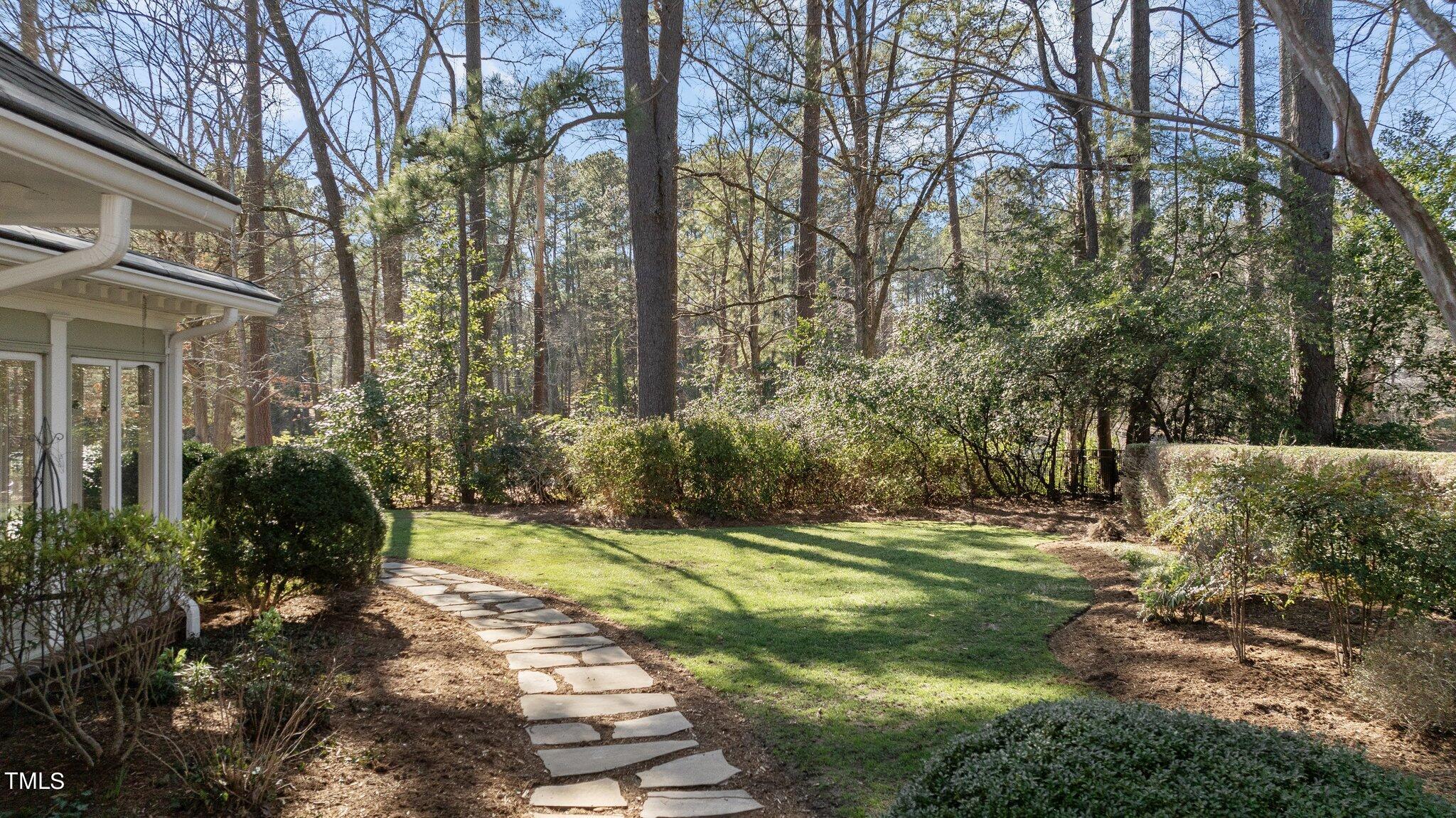 8 Surrey Lane Durham, NC 27707 - Photo 45 of 50 a view of a backyard