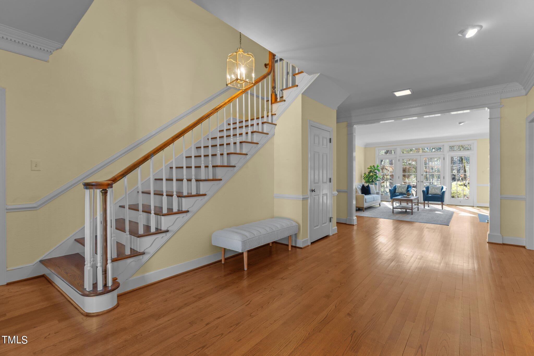8 Surrey Lane Durham, NC 27707 - Photo 6 of 50 a view of an entryway with wooden floor and windows