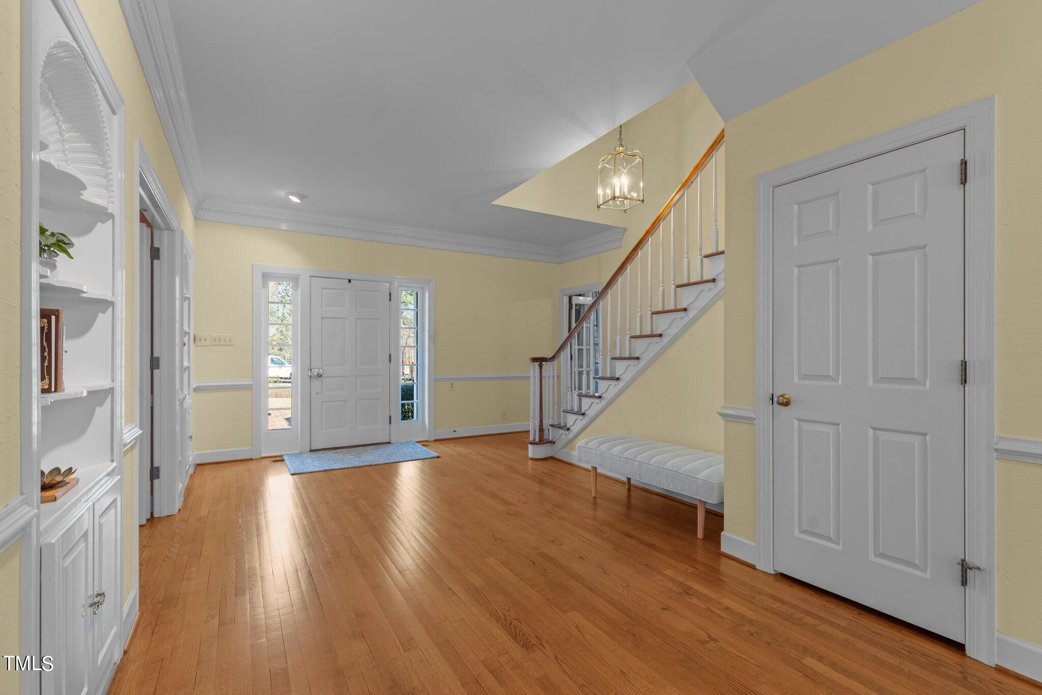 8 Surrey Lane Durham, NC 27707 - Photo 7 of 50 a view of entryway with wooden floor