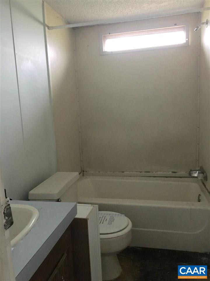 44 Jonquil Road Ruckersville, VA 22968 - Photo 7 of 12 a bathroom with a sink a toilet and shower