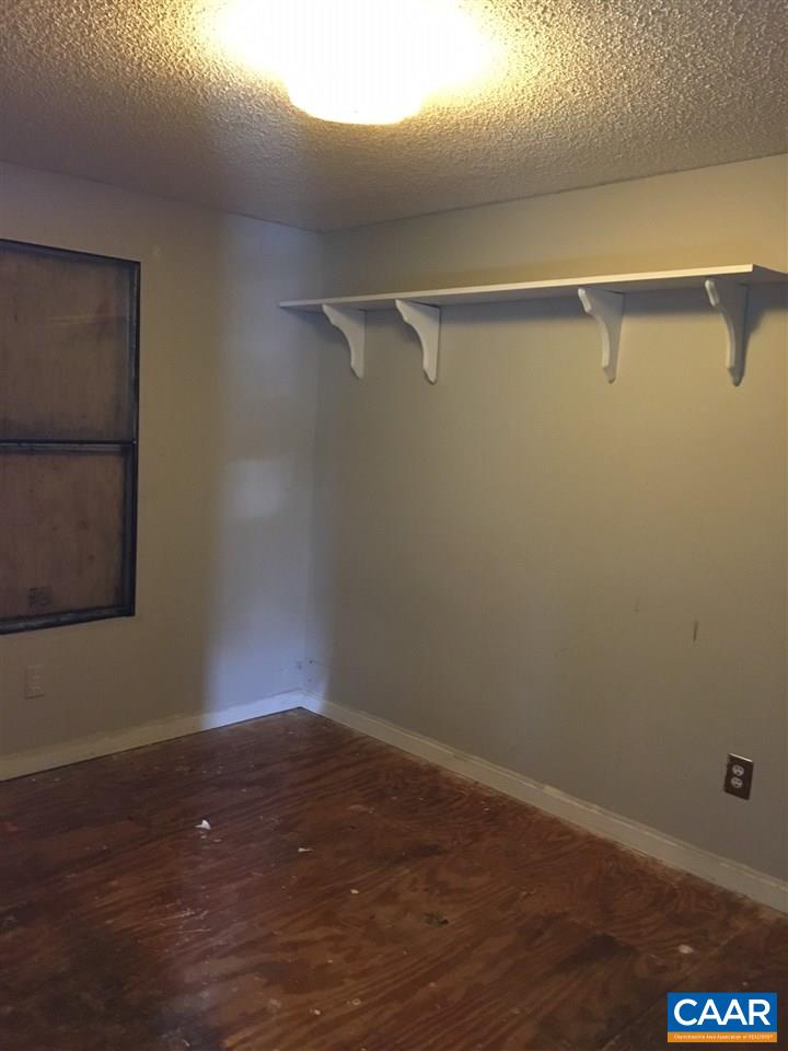 44 Jonquil Road Ruckersville, VA 22968 - Photo 8 of 12 a room with a wooden floor and a window