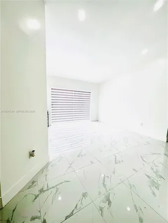 a view of a bathroom with shower