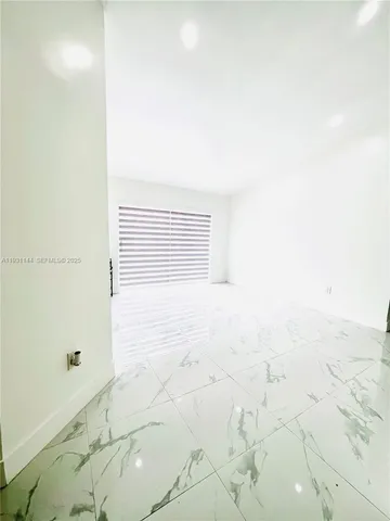 a view of a bathroom with shower