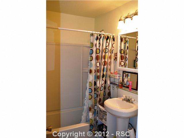 6755 Burrows Road Colorado Springs, CO 80908 - Photo 11 of 16 CAN'T SEE IT ALL BUT THIS BATH HAS BEEN TOTALLY REMODELED.