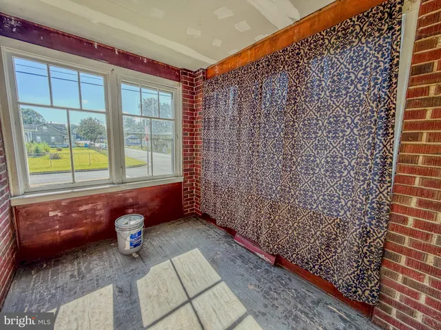a living room with a couch and a table