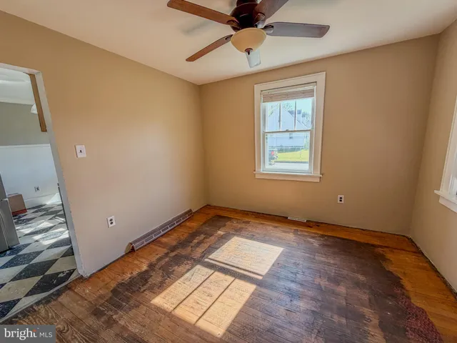 a view of an empty room and window