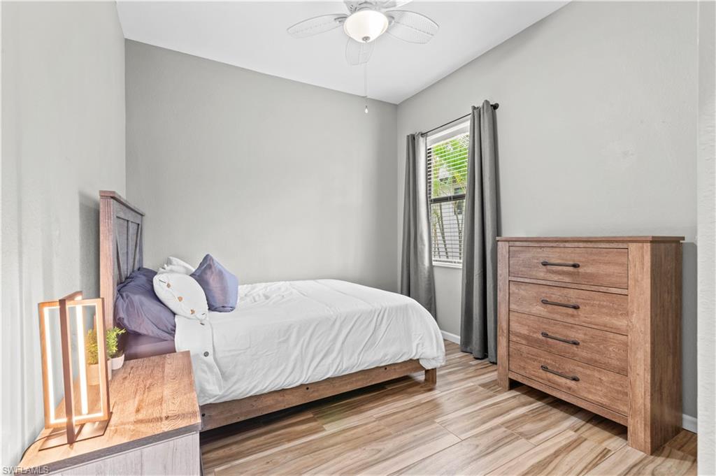 2123 Old Burnt Store Road North Cape Coral, FL 33993 - Photo 11 of 40 a bedroom with a bed and a window