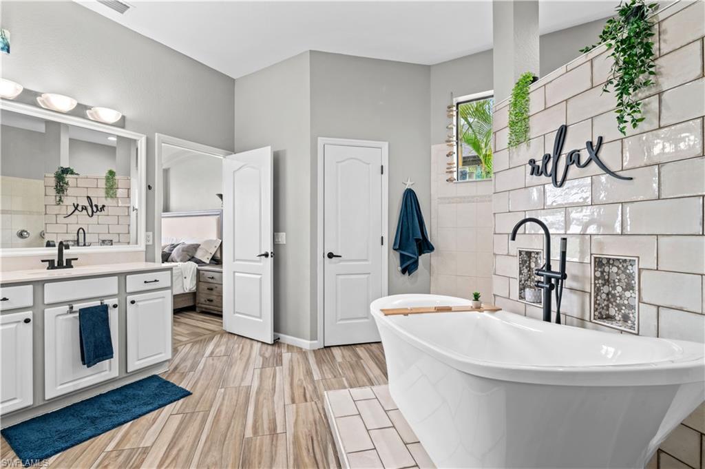2123 Old Burnt Store Road North Cape Coral, FL 33993 - Photo 26 of 40 a kitchen with a sink and a stove top oven