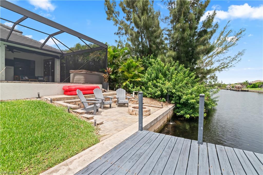 2123 Old Burnt Store Road North Cape Coral, FL 33993 - Photo 39 of 40 a view of backyard with a patio and wooden floor
