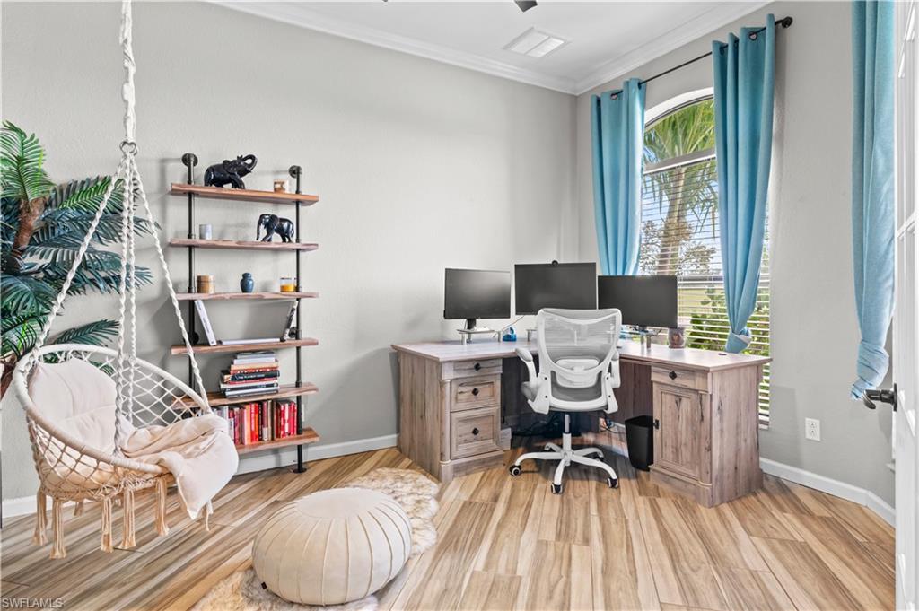2123 Old Burnt Store Road North Cape Coral, FL 33993 - Photo 5 of 40 a workspace with furniture and a window
