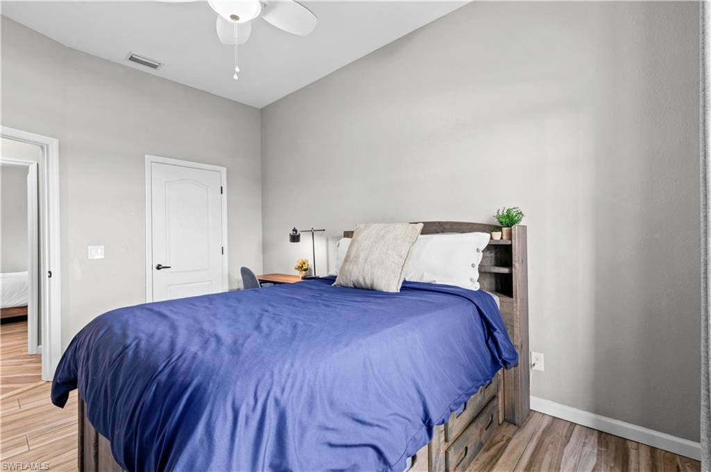 2123 Old Burnt Store Road North Cape Coral, FL 33993 - Photo 8 of 40 a bedroom with bed and window
