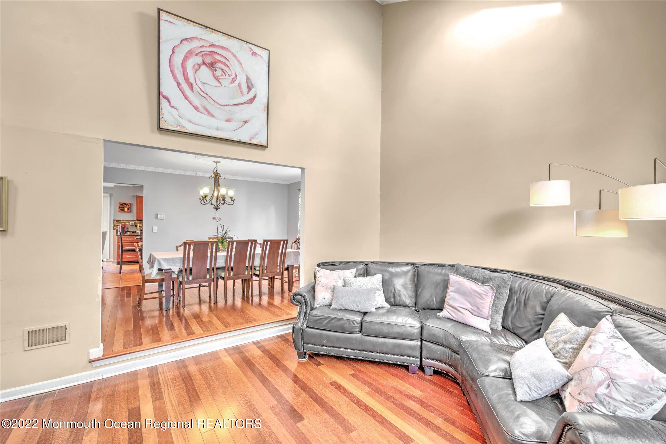 10 MacIntosh Court Jackson, NJ 08527 - Photo 11 of 49 a living room with furniture and a wooden floor