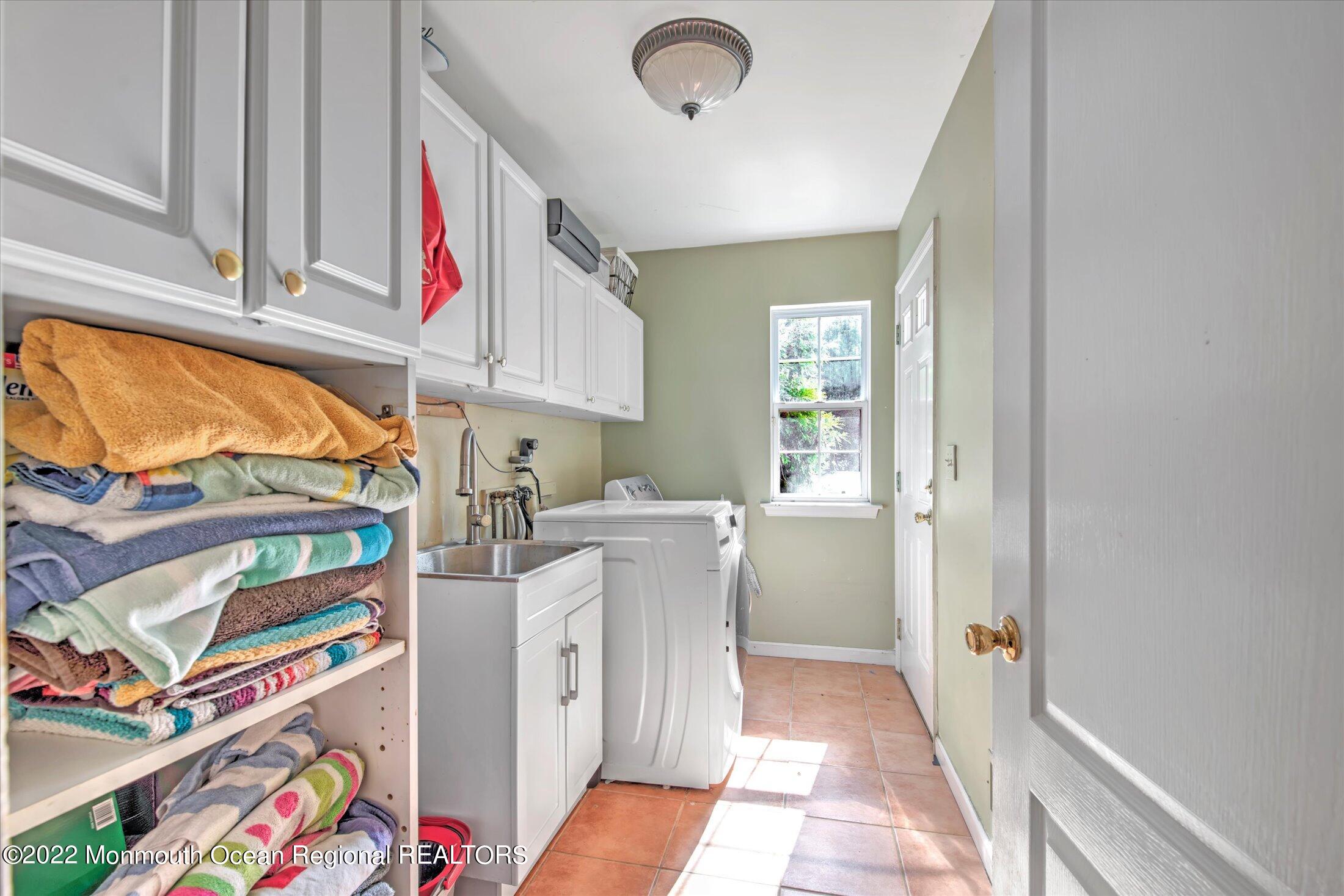 10 MacIntosh Court Jackson, NJ 08527 - Photo 32 of 49 a room with storage and utility