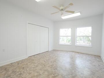 622 Nelson Point Road Niceville, FL 32578 - Photo 17 of 28 an empty room with a window and a fan