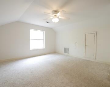 622 Nelson Point Road Niceville, FL 32578 - Photo 22 of 28 an empty room with windows and fan