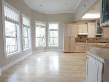 622 Nelson Point Road Niceville, FL 32578 - Photo 9 of 28 a kitchen with granite countertop a stove a sink wooden cabinets and a refrigerator