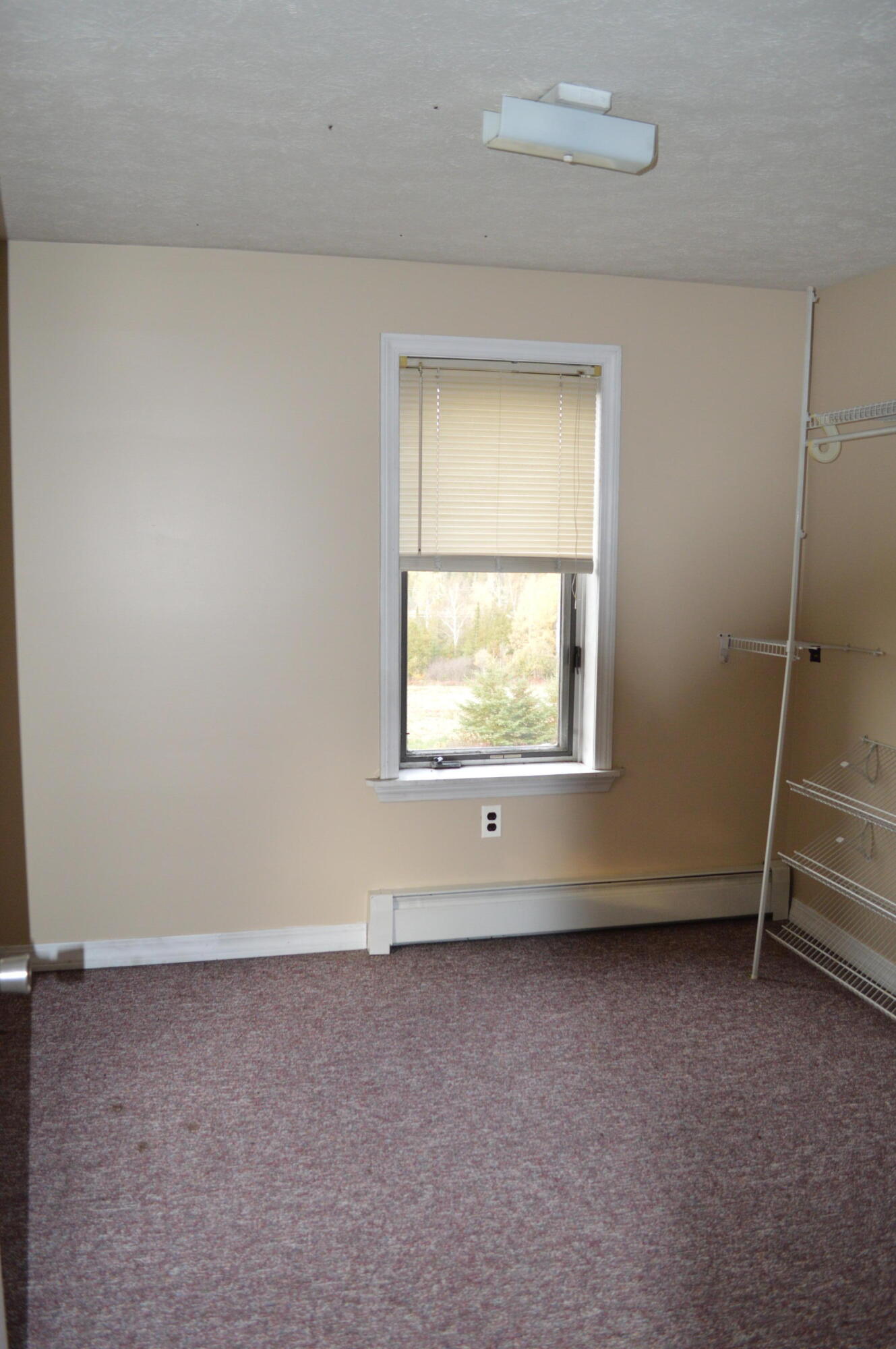 153 Pelletier Road Fort Kent, ME 04743 - Photo 27 of 36 Bedroom 4 used as a Closet for three sec