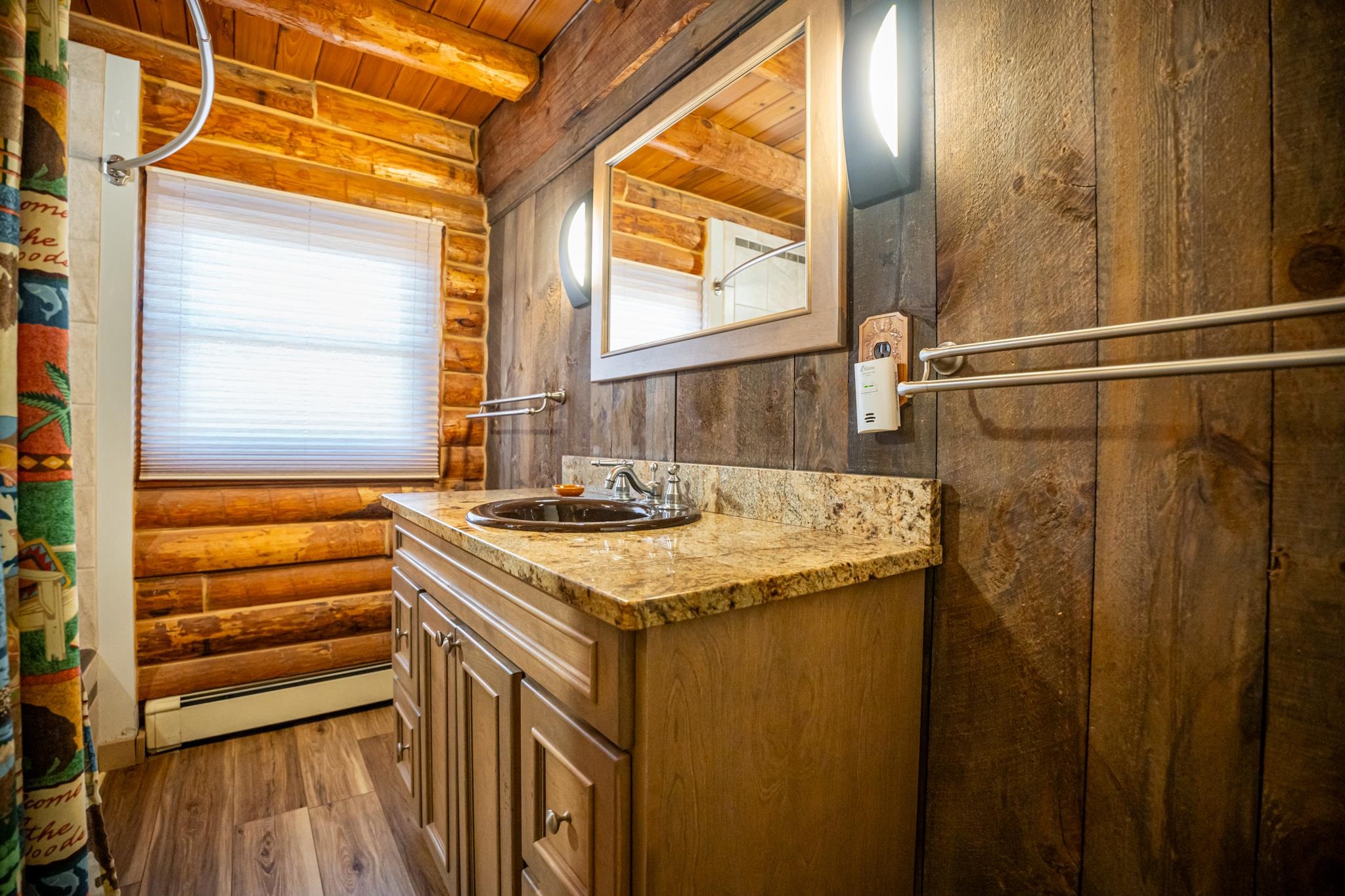18491 Caledonia Road Caledonia, IL 61011 - Photo 41 of 99 a bathroom with a sink and a mirror