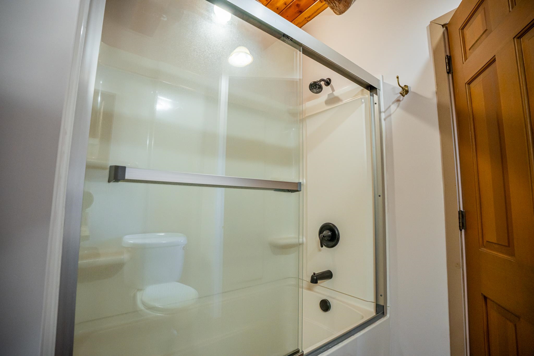 18491 Caledonia Road Caledonia, IL 61011 - Photo 63 of 99 a bathroom with a shower and toilet