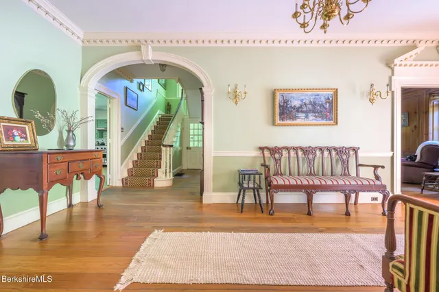 a kitchen with stainless steel appliances granite countertop a stove and a refrigerator