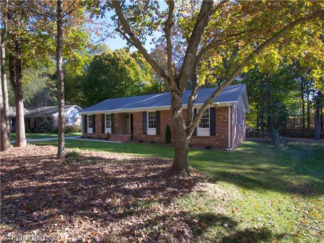 5110 Cheviot Road Greensboro, NC 27455 - Photo 2 of 16 Exterior Front. Covered front porch and brand new landscaping greet you!