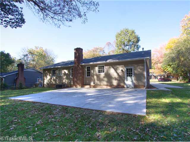5110 Cheviot Road Greensboro, NC 27455 - Photo 13 of 16 Exterior Back. Take a look at the oversized patio, perfect for entertaining and the spacious and green backyard.