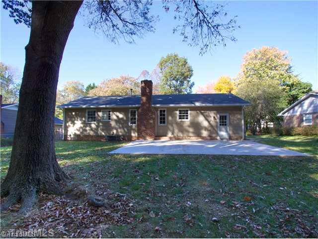 5110 Cheviot Road Greensboro, NC 27455 - Photo 16 of 16 Exterior Back. Great backyard and privacy.